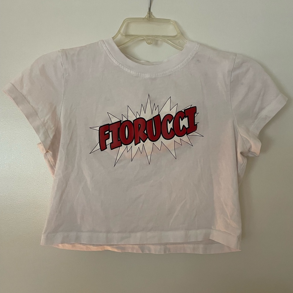 FIORUCCI Women’s cropped tshirt with “pow” graphic. Never worn! Size Small.